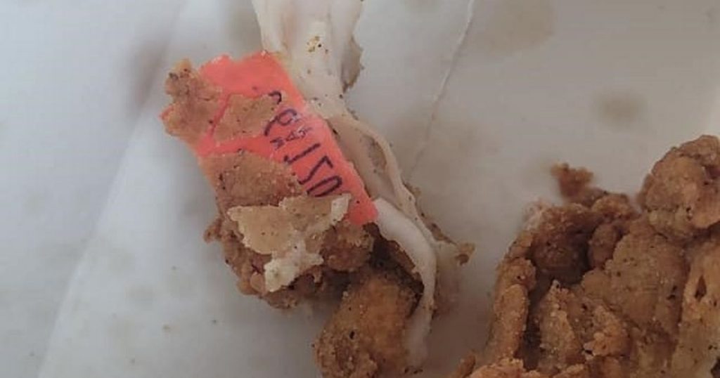A KFC customer found a red piece of plastic in his mini fillet - which he said was "under the seasoning"