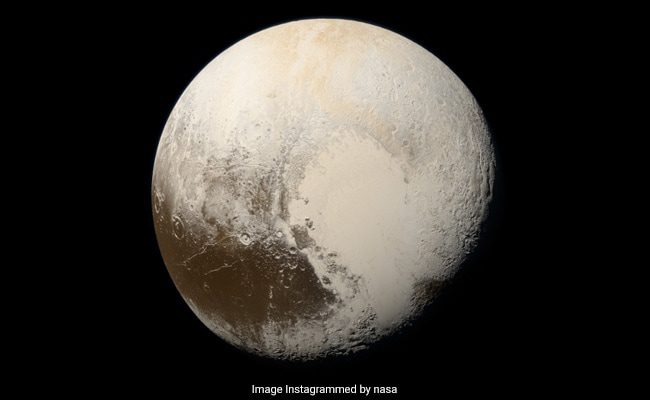 NASA shares a stunning photo of Pluto showing its true colors