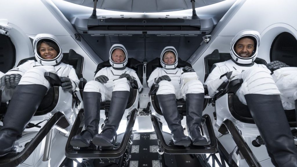 The Axiom Space Ax-2 private astronaut crew smiles in their Dragon capsule