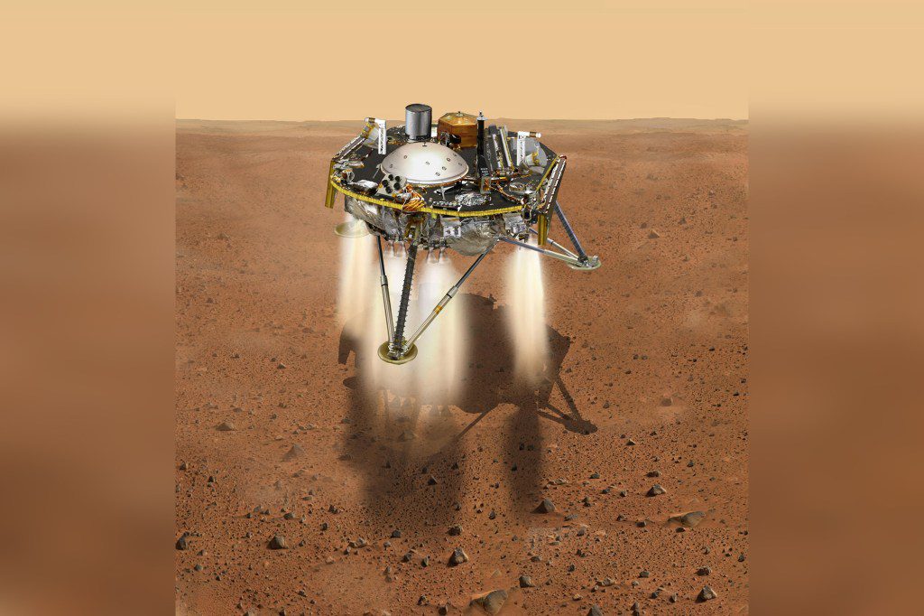 Ilustrasi NASA yang diterima pada 21 November 2018 ini menunjukkan simulasi demonstrasi eksplorasi interior NASA menggunakan wahana seismik, geodesi, dan transportasi termal yang meluncurkan roket retro untuk melambat saat turun menuju permukaan Mars.